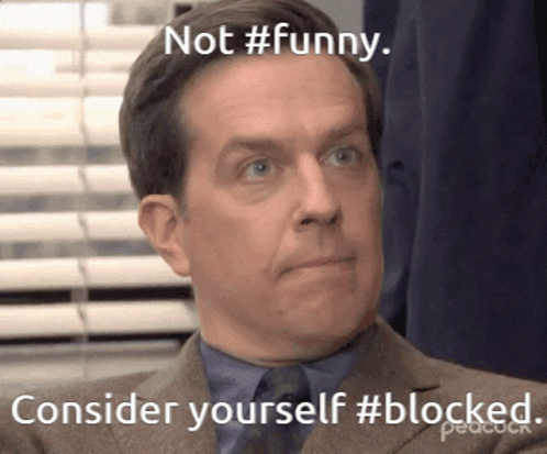 A Man In A Suit And Tie With A Caption That Says Not #Funny Consider Yourself #Blocked GIF