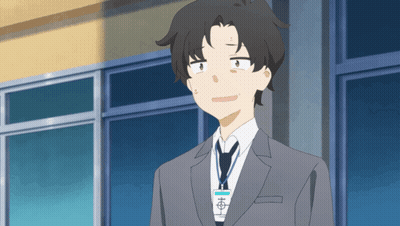A Man In A Suit And Tie With A Name Tag That Says ' Aoi ' On It GIF