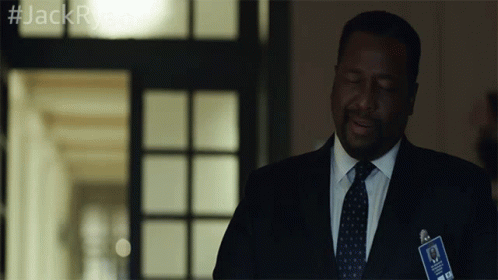 A Man In A Suit And Tie With A Name Tag That Says Jack GIF
