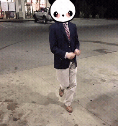 A Man In A Suit And Tie With A Panda Face On His Face GIF