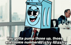 A Man In A Suit And Tie With A Washing Machine On His Head Says You Gotta Pump Those Up GIF