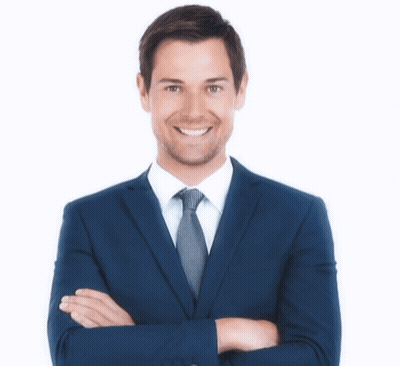 A Man In A Suit And Tie With His Arms Crossed Is Smiling GIF