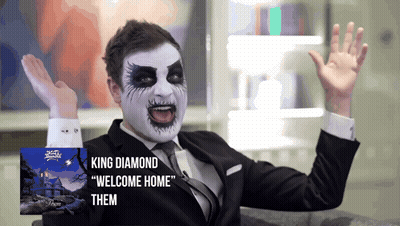 A Man In A Suit And Tie With King Diamond Welcome Home Them Written On The Bottom GIF