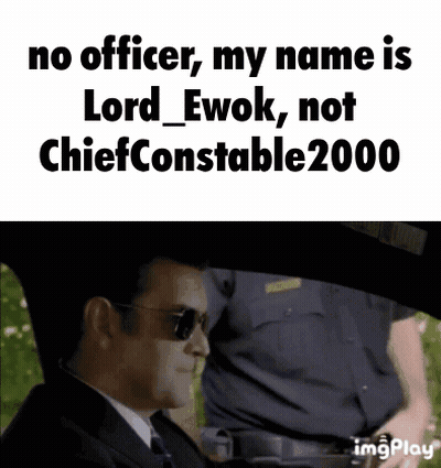 A Man In A Suit And Tie With Sunglasses Says No Officer My Name Is Lord Ewok Not Chief Constable 2000 GIF