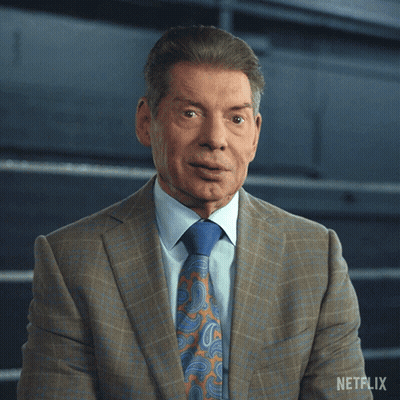 A Man In A Suit And Tie With The Word No On His Face GIF