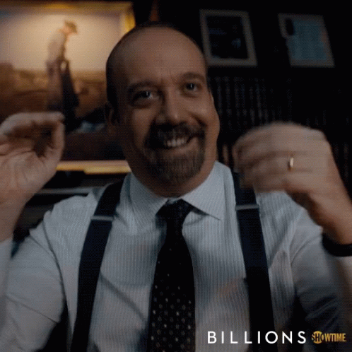 A Man In A Suit And Tie With The Words Billions Showtime Below Him GIF