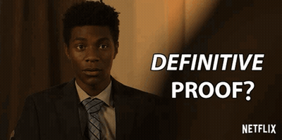 A Man In A Suit And Tie With The Words Definitive Proof Written Above Him GIF