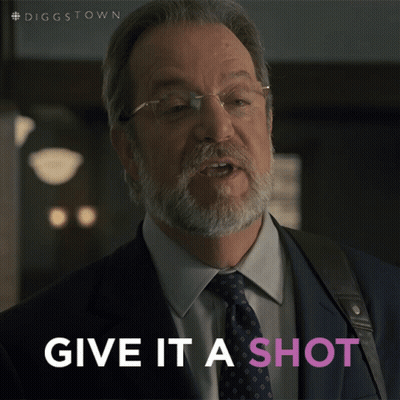 A Man In A Suit And Tie With The Words Give It A Shot Below Him GIF