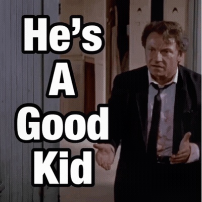 A Man In A Suit And Tie With The Words He 'S A Good Kid Behind Him GIF