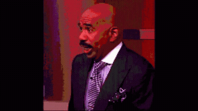 A Man In A Suit And Tie With The Words Hello Lashan Perera Below Him GIF