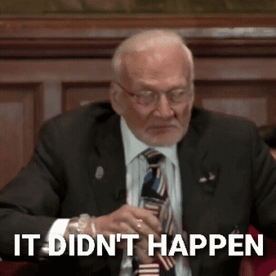 A Man In A Suit And Tie With The Words It Did N't Happen Below Him GIF