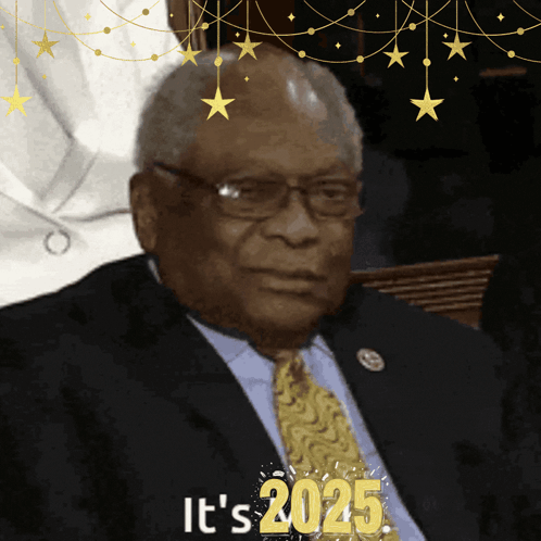 A Man In A Suit And Tie With The Words It 'S 2025 GIF