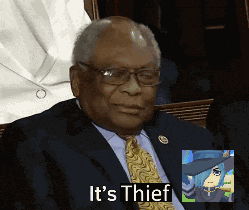A Man In A Suit And Tie With The Words It 'S Thief Below Him GIF