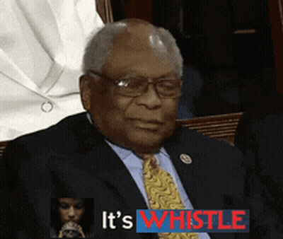 A Man In A Suit And Tie With The Words It 'S Whistle Behind Him GIF