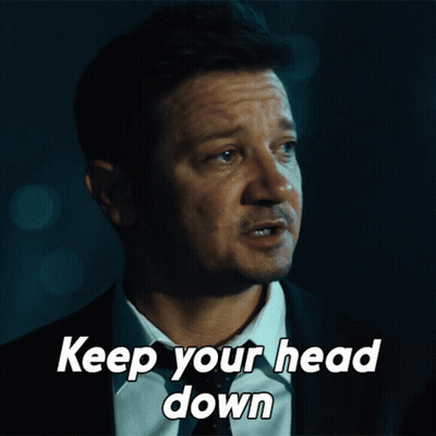A Man In A Suit And Tie With The Words Keep Your Head Down GIF