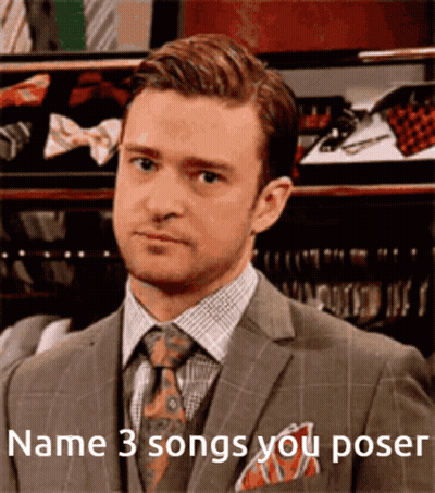 A Man In A Suit And Tie With The Words " Name 3 Songs You Poser " On The Bottom GIF