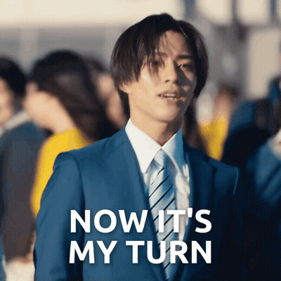 A Man In A Suit And Tie With The Words Now It 'S My Turn Above Him GIF