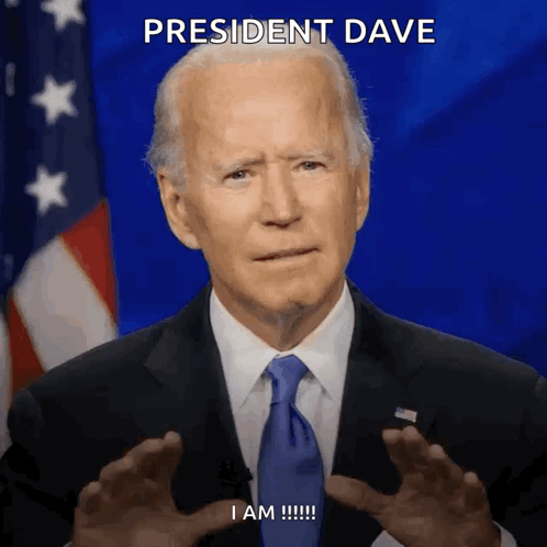 Man In Suit And Tie With President Dave GIF