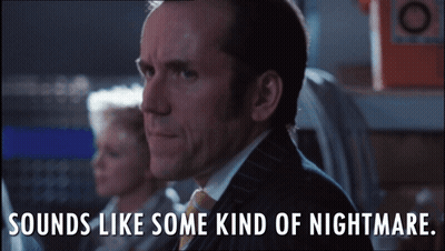 A Man In A Suit And Tie With The Words Sounds Like Some Kind Of Nightmare Below Him GIF