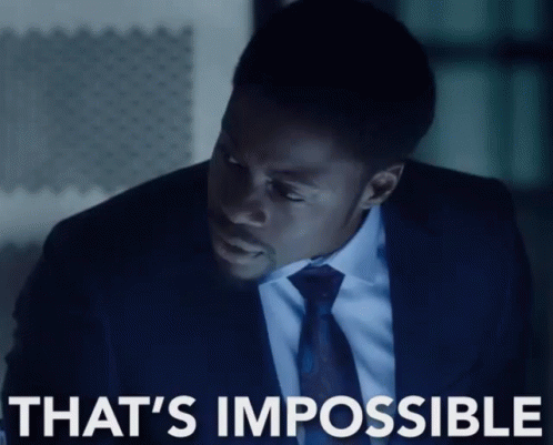 A Man In A Suit And Tie With The Words That 'S Impossible Above Him GIF