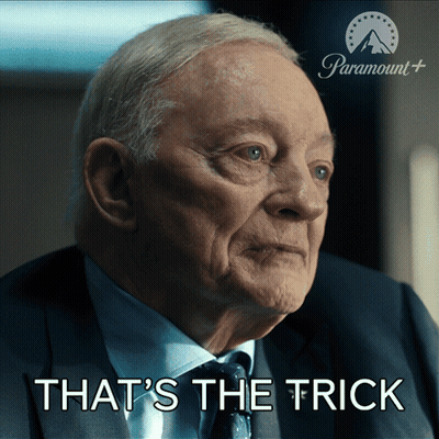 A Man In A Suit And Tie With The Words That 'S The Trick Below Him GIF