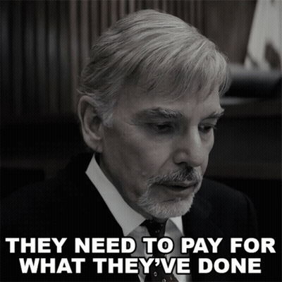A Man In A Suit And Tie With The Words They Need To Pay For What They 'Ve Done GIF