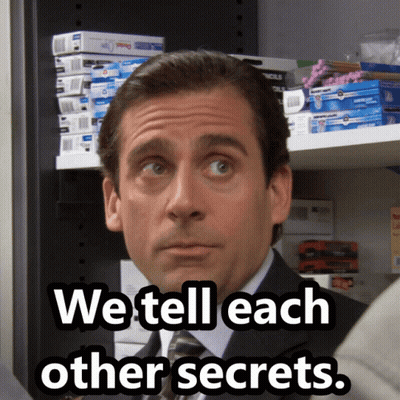 A Man In A Suit And Tie With The Words We Tell Each Other Secrets Below Him GIF