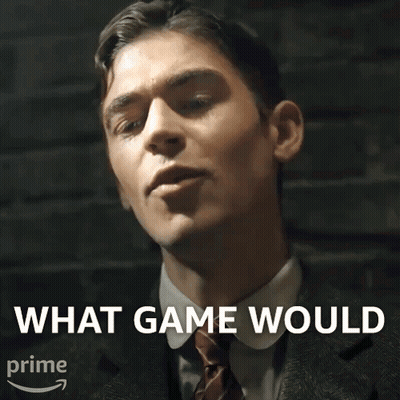 A Man In A Suit And Tie With The Words What Game Would Above Him GIF