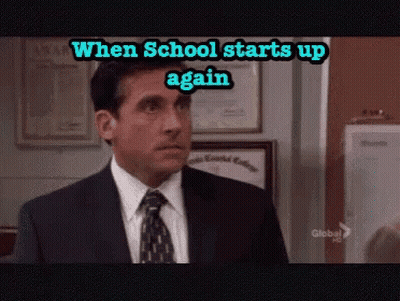 A Man In A Suit And Tie With The Words When School Starts Up Again GIF