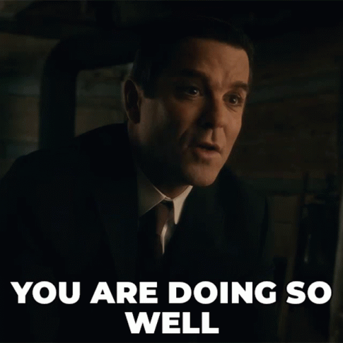 A Man In A Suit And Tie With The Words You Are Doing So Well Below Him GIF