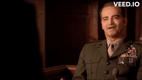 A Man In A Suit And Tie With The Words " You Can 'T Handle Truth " Above Him GIF