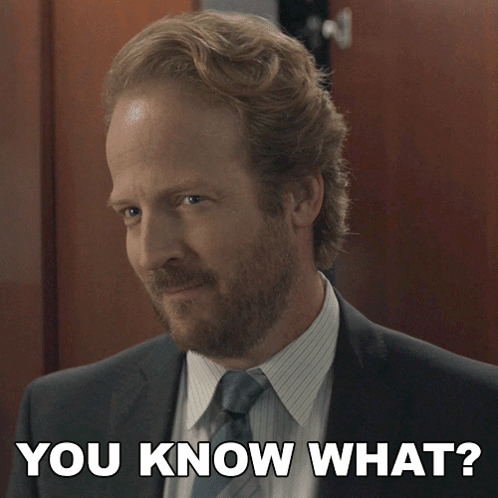 A Man In A Suit And Tie With The Words You Know What Above Him GIF