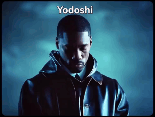 A Man In A Suit And Tie With Yodoshi Written On The Top GIF