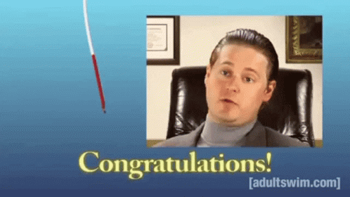 A Man In A Suit And Turtleneck Is Sitting In A Chair With The Words Congratulations On The Bottom GIF
