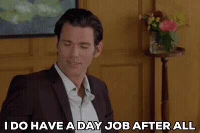 A Man In A Suit And White Shirt Is Saying I Do Have A Day Job After All GIF