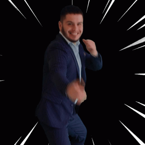 A Man In A Suit Giving The Middle Finger In Front Of A Black Background That Says Bring It On GIF