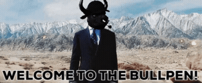 A Man In A Suit Has A Bull Mask On His Head And The Words Welcome To The Bullpen Below Him GIF