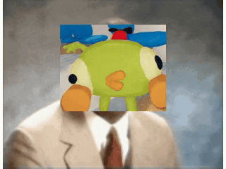 A Man In A Suit Has A Picture Of A Stuffed Animal On His Head GIF