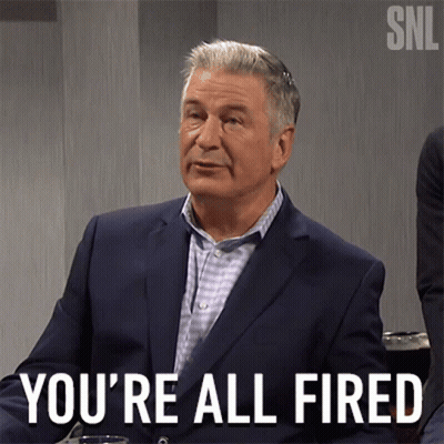 A Man In A Suit Has The Words You 'Re All Fired Written On His Face GIF