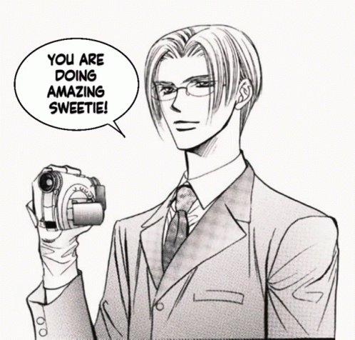 A Man In A Suit Holding A Camera With A Speech Bubble That Says " You Are Doing Amazing Sweetie " GIF