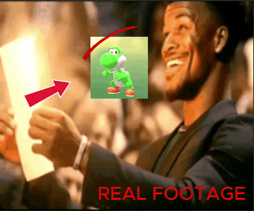 A Man In A Suit Holds A Piece Of Paper With A Picture Of Yoshi On It GIF