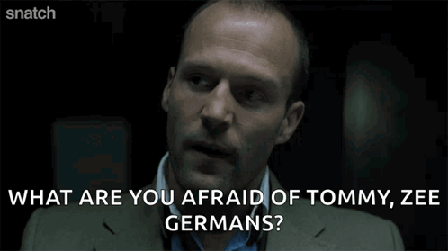 A Man In A Suit Is Asking What Are You Afraid Of Tommy Ze Germans GIF