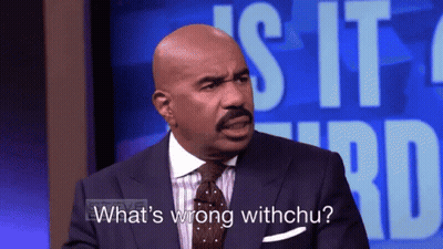 A Man In A Suit Is Asking What 'S Wrong Withchu GIF