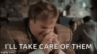 A Man In A Suit Is Covering His Face With His Hands And Saying `` I 'Ll Take Care Of Them '' GIF