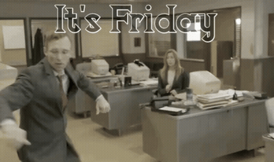 A Man In A Suit Is Dancing In An Office With The Words It 'S Friday GIF