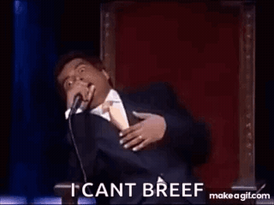 A Man In A Suit Is Dancing On A Stage With The Words `` I Can 'T Breef '' . GIF
