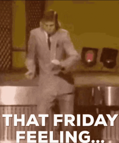 A Man In A Suit Is Dancing With The Words That Friday Feeling GIF