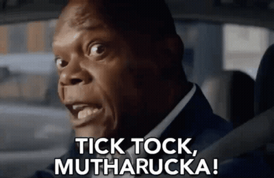 A Man In A Suit Is Driving A Car And Says Tick Tock , Mutharucka ! GIF