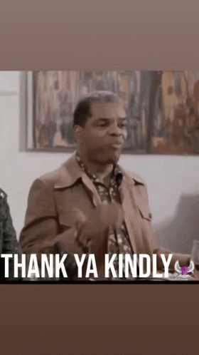 A Man In A Suit Is Giving A Thumbs Up With The Words `` Thank Ya Kindly '' . GIF