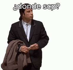 A Man In A Suit Is Holding A Jacket And Has The Words Donde Scp Written Above Him GIF